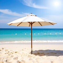 White beach umbrella on sandy shore