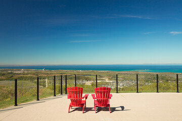 Ontario, Canada,gorgeous, inviting ,natural landscape view from the mountain on the village, sunny autumn day, blue sky, Georgian Bay, Lake Huron in background 