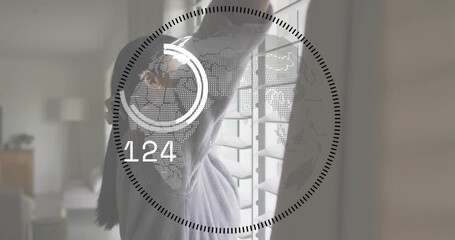 Woman opening drape and shutters at smart window, launching gauge overlay tracking stock limit - Powered by Adobe