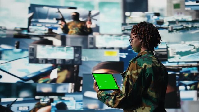 Isolated screen mockup tablet warning system used by military operator to monitor incoming enemy aerial attacks. Army agent maintains air space superiority with radar on chroma key device, camera A