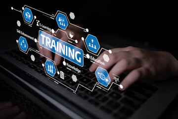 A close-up of hands typing on a laptop keyboard showcasing a training concept with digital icons, representing the future of online learning, skill enhancement, and education development. Tessel