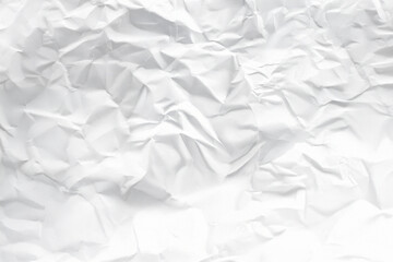 white and gray crumpled paper texture background. crush paper so that it becomes creased and...