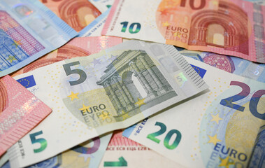 Euro banknotes background. Close up, shallow depth of field.
