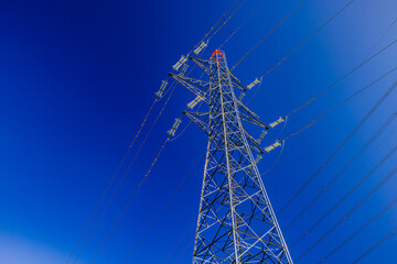 Steel tower shining against the blue sky