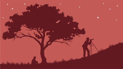 Fototapeta premium Silhouette of Photographer with Tripod at Night Under a Tree with a Person Sitting in the Grass Vector Illustration Graphic Design Nature Photography Dark Red Starry Night.