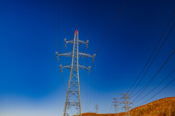 Steel tower shining against the blue sky