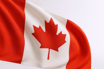 Obraz premium Canadian flag waving in the wind, national symbol of Canada, patriotism, independence day