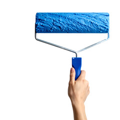 A hand holds a paint roller with blue paint against a stark black background