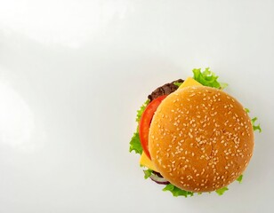 Top view of a cheeseburger on a white background