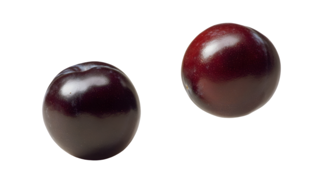 The smooth purple plum emphasizes color richness and shape, isolated on white
