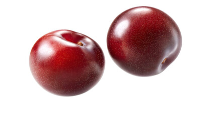 Obraz premium A glossy purple plum glides effortlessly in the air, isolated on white