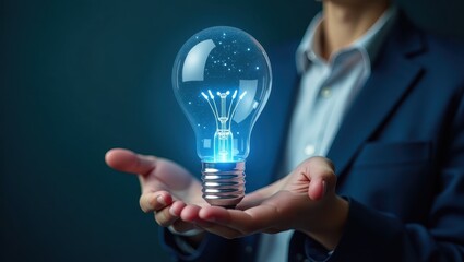 Glowing illuminated lightbulb held gently by a person, symbolizing innovation and creativity with a futuristic design on a dark background. The lightbulb represents a new idea, solution, or vision.