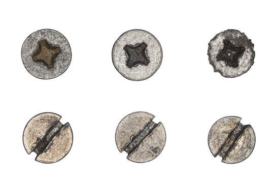 Used screw and bolt heads with signs of wear, scratches, dents, rust spots. Close-up view. Isolated on transparent background. Set 3.
