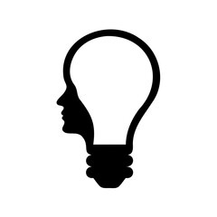 Silhouette of a head inside a light bulb representing creative thought process