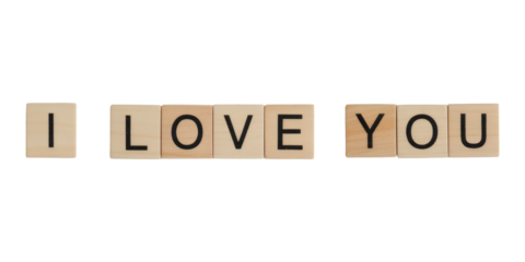 Express heartfelt sentiments with classic wooden tiles spelling "I LOVE YOU" for a timeless declaration of affection.