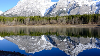 mountain reflection in the lake, lake in the mountains of  Canada, autumn in the mountains, Autumn foliage in Rockies Mt. Canada, Banff,  Kananaskis, Nature, wildlife, season