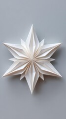 Surreal digital Intricate Geometric Origami Star Against Gray Background visual composition