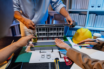 A diverse team of professionals shares ideas about architectural layouts and structural concepts, focusing on teamwork, creativity, and precision in modern engineering design discussions.