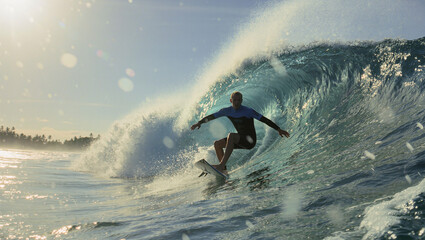 Surfers are braving powerful waves.