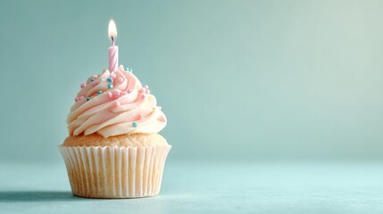 cupcake. A solitary birthday cupcake topped with frosting and a candle, set against a soft pastel backdrop. symbolizing life milestones and joyful moments.