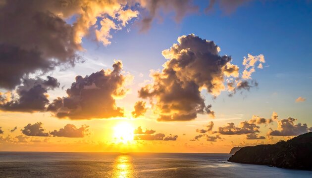 Sunrise over the ocean with dramatic clouds