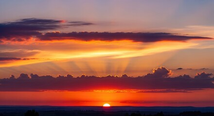 Naklejka premium Sunset sky clouds orange red sun sunlight horizon nature landscape scenic beauty peaceful evening glow