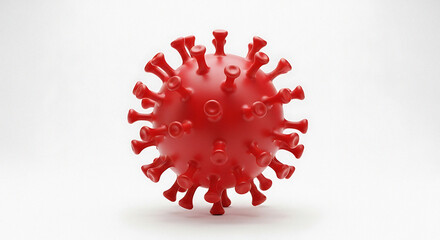 A single red coronavirus cell with spikes on a white background in a studio shot close up view