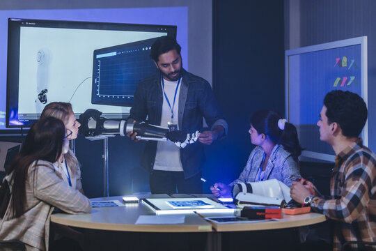 Innovative Team Testing Advanced Robotic Prosthetic Arm - Powered by Adobe