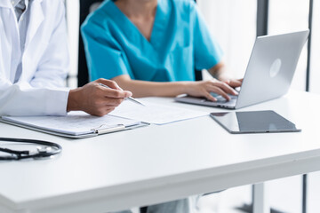 Doctor and Medical Team Discussing Patient Care