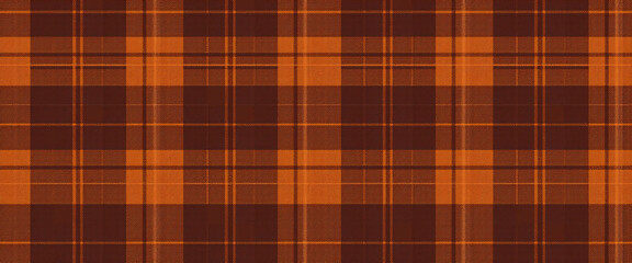 Obraz premium Seamless brown and orange plaid pattern in autumn tones cozy rustic fabric texture textile design