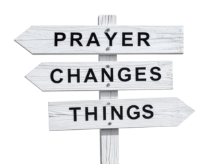 A wooden signpost with three directional arrows displaying the phrases "PRAYER," "CHANGES," and "THINGS" in bold letters.