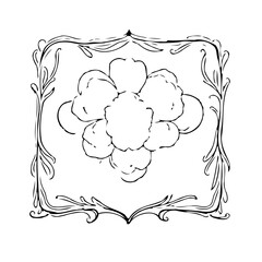 Elegant floral arrangement with an ornate frame showcasing a delicate bouquet of blossoms in a