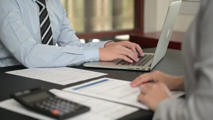 Finance and accountant team working in office for accounting and preparation services for financial statements and cash flow with analyze data insight for finance and taxation planning.	