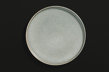 Ceramic plate on dark background