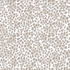 Obraz premium Abstract modern leopard seamless pattern. Animals trendy background. Beige and black decorative vector stock illustration for print, card, postcard, fabric, textile. Modern ornament of stylized skin.