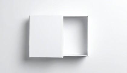 Overhead shot of a partially open white rectangular box, displaying its interior against a bright, neutral background.