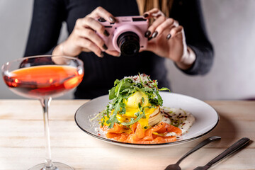 Brunch pancakes with salmon and arugula captured by food photographer