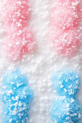 Fototapeta premium Pink and blue bunnies dusted in sugar; close-up