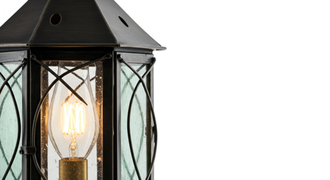 Antique lantern with glowing filament bulb isolated on black background