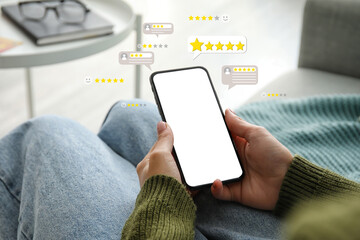 Woman using mobile phone at home