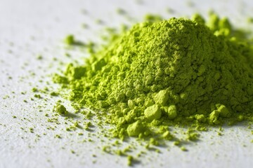 Vibrant Emerald Green Matcha Powder Macro Piled on White Surface for Wellness Advertising and Healthy Lifestyle Promotion

