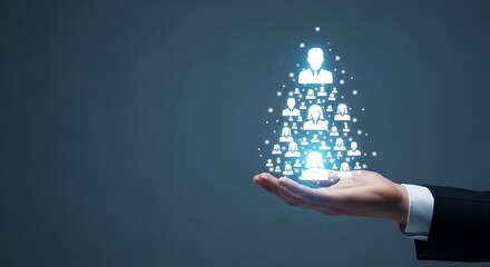 Empowering your team, a hand holds digital icons of people, representing talent acquisition, HR solutions, and building a strong workforce network