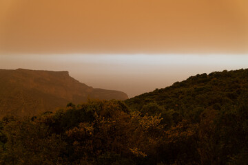 sandstorm over mountains