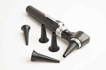 Otoscope with model for audiologist or ENT doctor use otoscope checking ear and treat hearing loss problem.