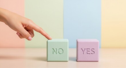 A human hand points at a pale green block labeled NO Nearby a pale purple block is labeled YES set against a pastel segmented background