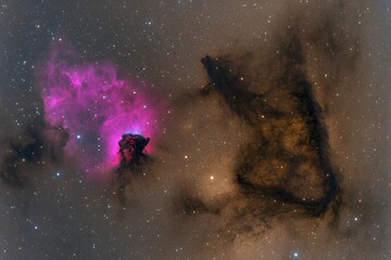 Cosmic Nebulae, Vibrant Pink and Dark Brown Clouds in Space