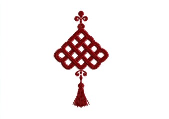 Red, intricate, diamond-shaped ornament with tassel