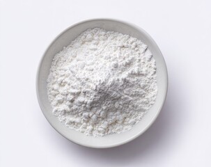 White flour in a shallow white bowl, top view (1)