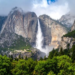 Scenic view of a powerful waterfall cascading down a rocky mountain