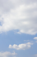 
Blue sky with puffy clouds